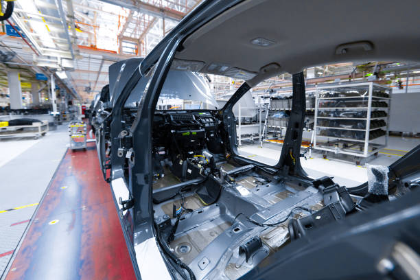 istock Automotive mechanical assembly, engine, transmission, suspension and breaking system. Automotive engine assembly line is in production. Car Assembly by parts 1072287414