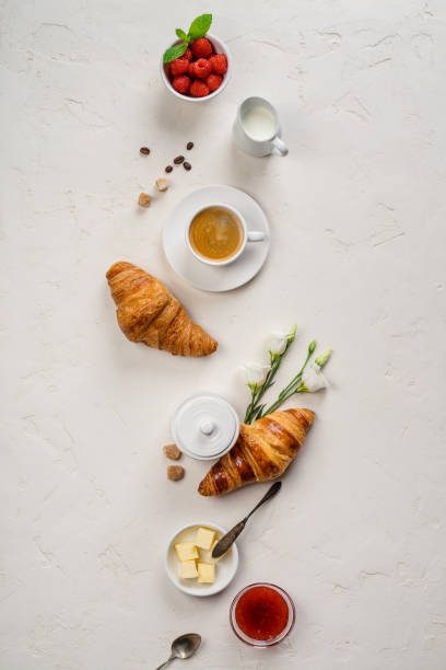 istock Continental breakfast captured from above on concrete background 1072291990