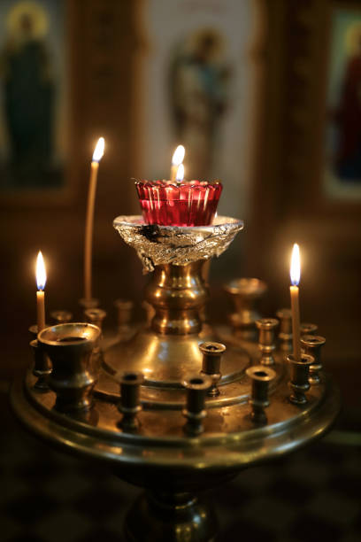 istock Details of candlestick with burning candles 1072292088