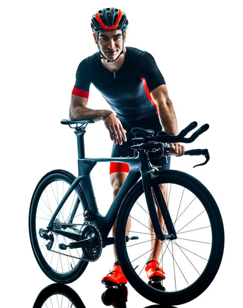 istock triathlete triathlon Cyclist cycling silhouette isolated white b 1072299794