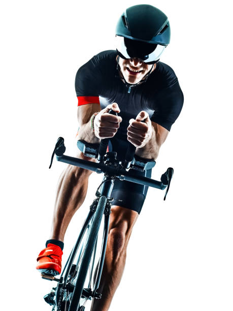 istock triathlete triathlon Cyclist cycling silhouette isolated white b 1072299812