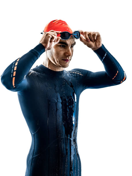 istock triathlete triathlon Swimmer swimsuit silhouette isolated white 1072300948