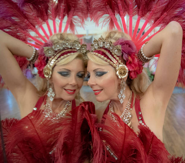 istock Macedonian belly dancer rehearses with her own image in a dancers mirror. 1072302910