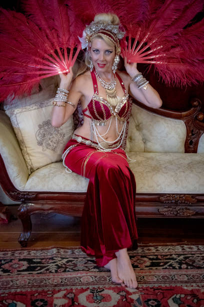istock Middle aged Macedonian belly dancer rehearses her routine in a studio. 1072303328