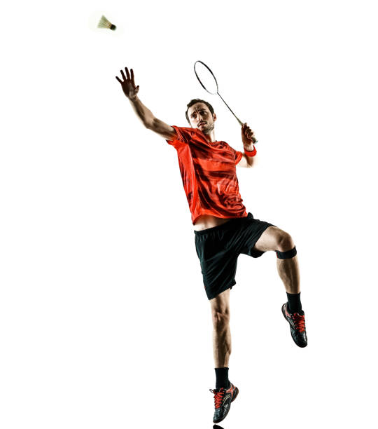 istock Badminton player man shadow silhouette isolated white backgroun 1072306546