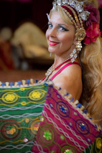 istock Close up of Middle aged Macedonian belly dancer rehearses her routine in a studio. 1072311036