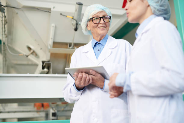 istock Happy Senior Worker at Factory 1072311134