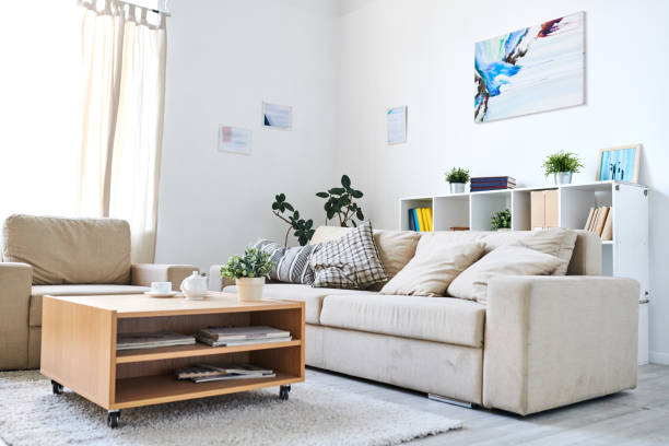 istock Cozy living room with abstract picture on wall 1072311738