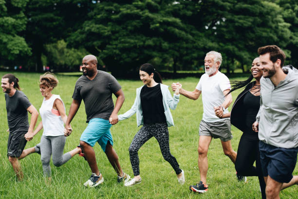 istock Happy diverse people enjoying in the park 1072319484