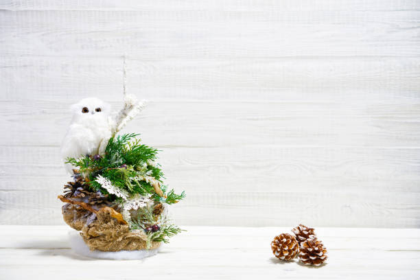 istock Christmas decorations on white wooden background. 1072319568