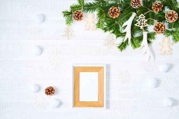 istock Christmas decorations on white wooden background. 1072320796