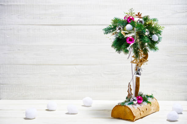 istock Christmas decorations on white wooden background. 1072321308