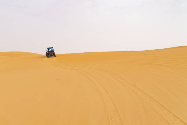 istock 4x4 at the moroccan desert dunes 1072323374