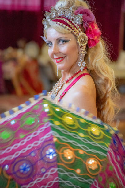 istock Middle aged Macedonian belly dancer rehearses her routine in a studio. 1072328124