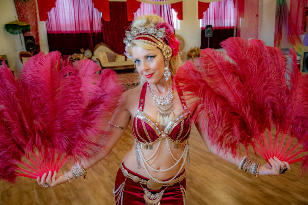 istock Middle aged Macedonian belly dancer rehearses her routine in a studio. 1072331658