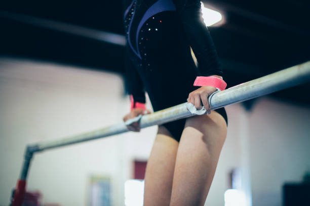 istock Young gymnast on a horizontal bar 1072334418