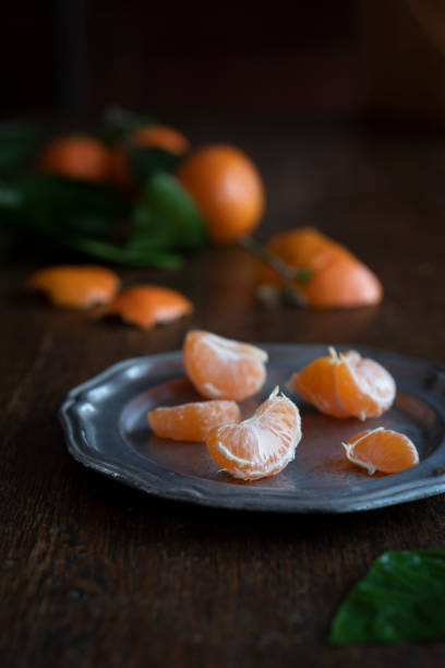 istock Satsuma Mandarins on an Wooden Table 1072335296