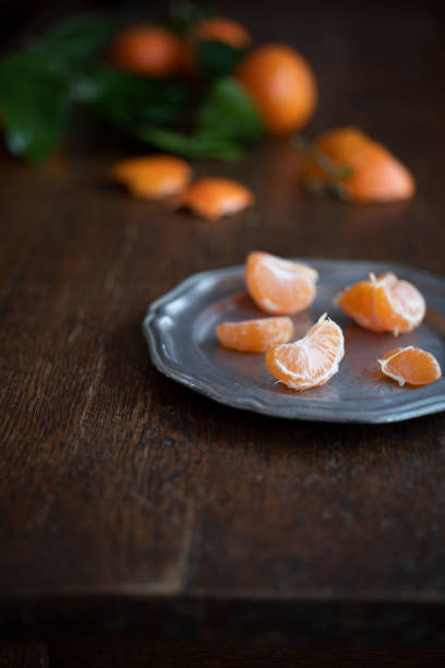 istock Satsuma Mandarins on an Wooden Table 1072335464