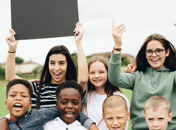 istock Group of diverse kids supporting a movement 1072338754