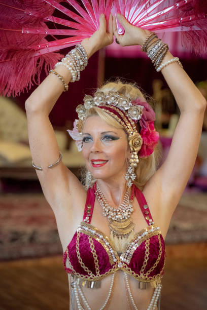 istock Close up of Mature Macedonian belly dancer rehearsing her routine in a studio. 1072347368