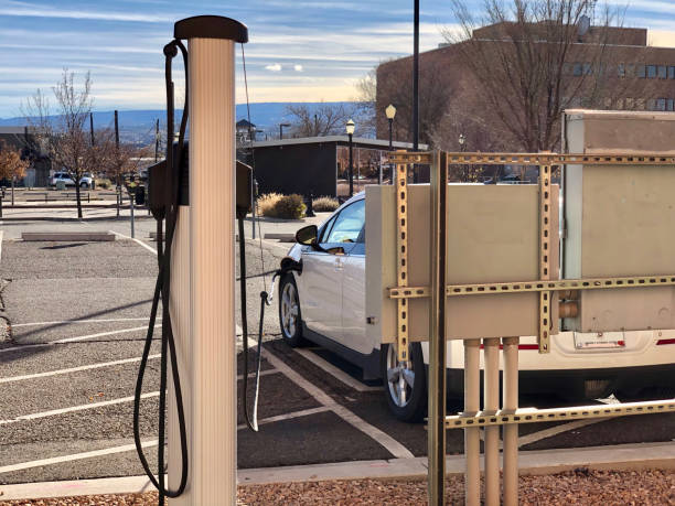 istock An Electric Vehicle Viewed From Behind Charging Station 1072351940