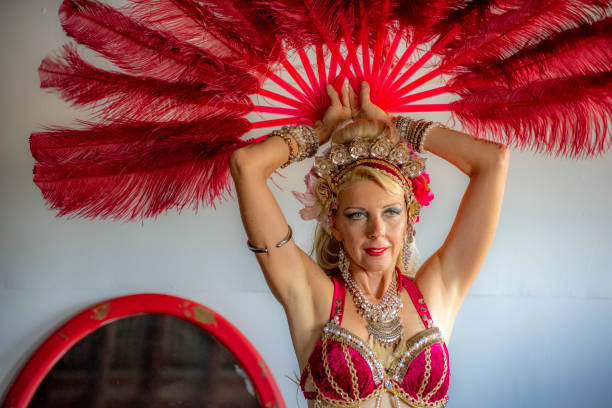 istock Middle aged Macedonian belly dancer rehearses her routine in a studio. 1072353320