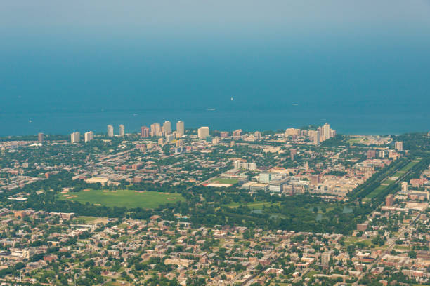 Suburban Chicago Aerial view of a part of Chicago along the shoreline of Lake Michigan chicago smog stock pictures, royalty-free photos & images