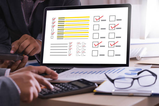 istock businessman SURVEY and Results Analysis Discovery Concept 1072353890