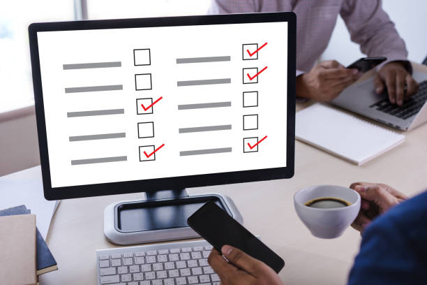 istock businessman SURVEY and Results Analysis Discovery Concept 1072353974