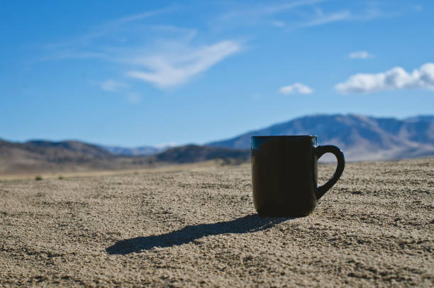 istock A solo coffee mug on the dunes 1072354234