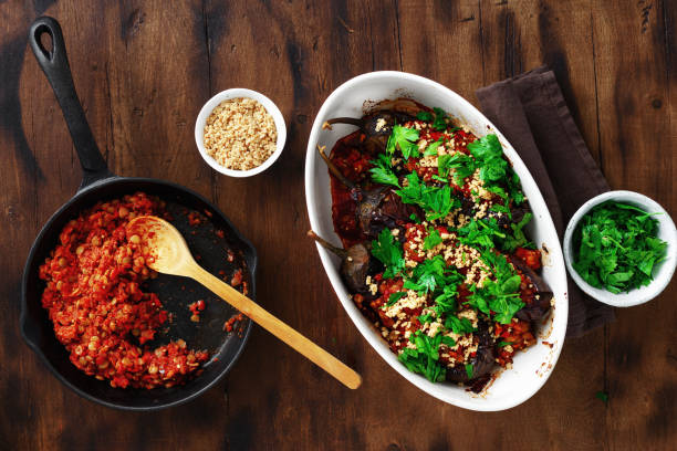 Vegetarian baked stuffed eggplant lentils top view Healthy vegetarian food