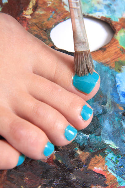 istock legs with new pedicure 1072369892