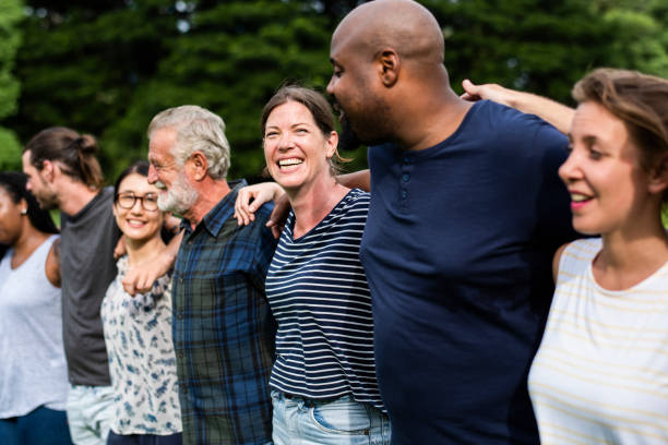 istock Cheerful diverse people together in the park 1072377258