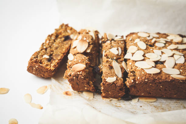 istock Vegan carrot bread with almonds on a white background, copy space. 1072384948
