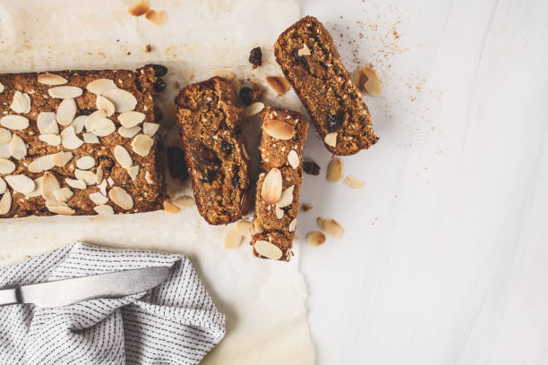 istock Vegan carrot bread with almonds on a white background, copy space. 1072385494