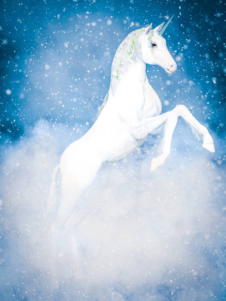 istock 3D rendering of a magical white unicorn in snow. 1072395776