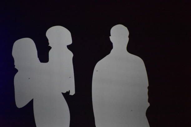 istock Family silhouette at sunset 1072397724