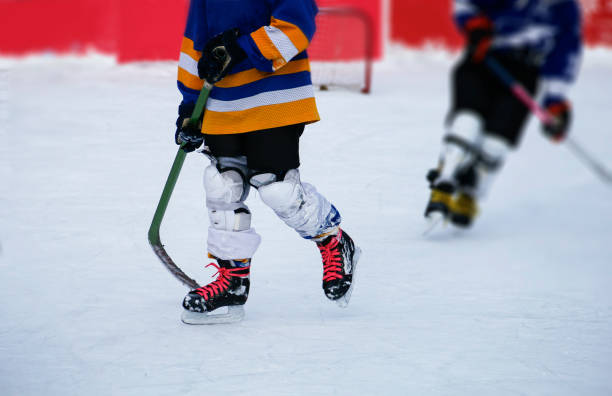 istock Kids at ice hockey practice. 1072402326