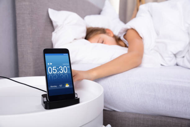 istock Girl Snoozing Alarm On Cellphone 1072407206