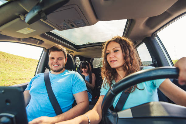 istock friends in car. road trip 1072407568