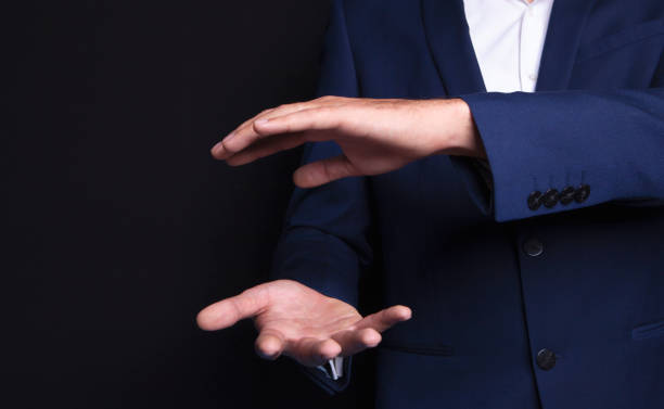 istock businessman holds his hands 1072407676