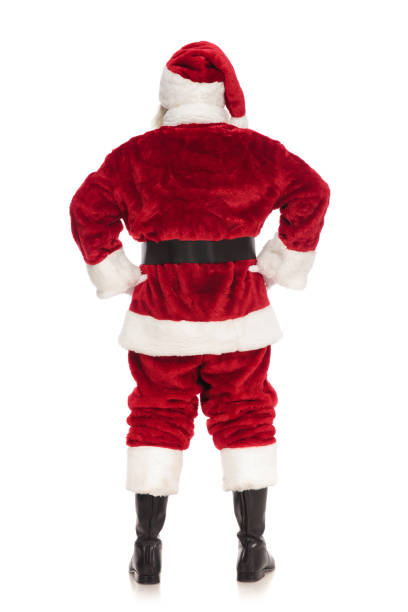back view of santa claus standing with hands on hips on white background, full body picture