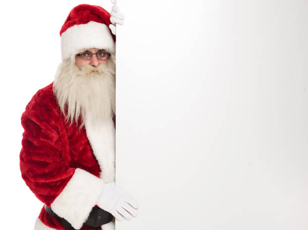 istock portrait of saint nick holding a white board to side 1072412792