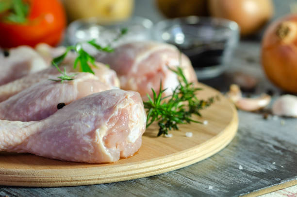 istock Raw chicken legs are prepared to be cooked 1072420866