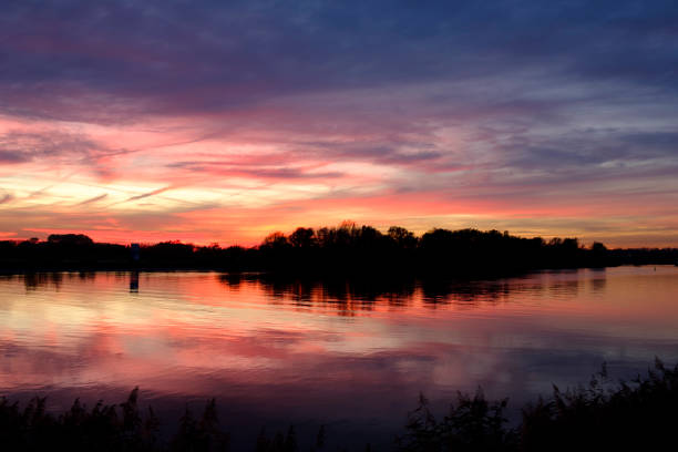 istock Majestic sunset over the river IJssel during a beautiful autumn evening 1072423134