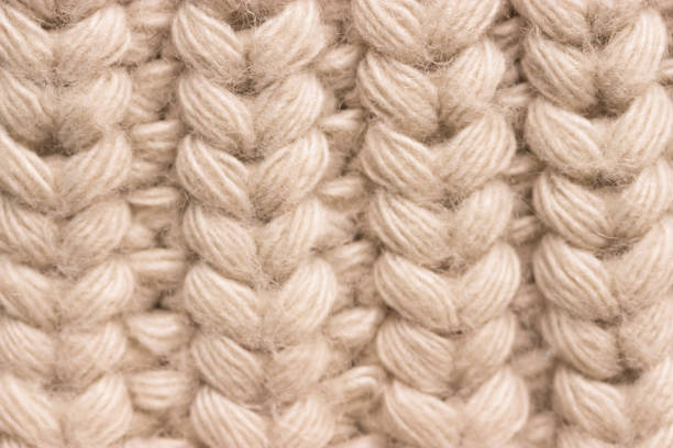 istock Close-up of knitted wool sweater. grey colour 1072425400