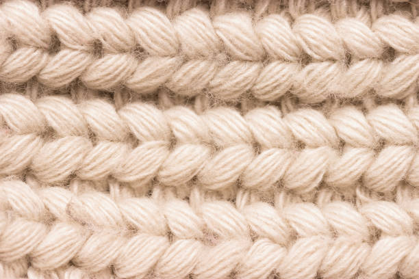 istock Close-up of knitted wool sweater. grey colour 1072425412