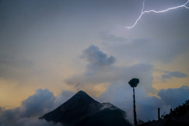 istock Lightning and clouds during sunset over volcano Fuego. 1072430530