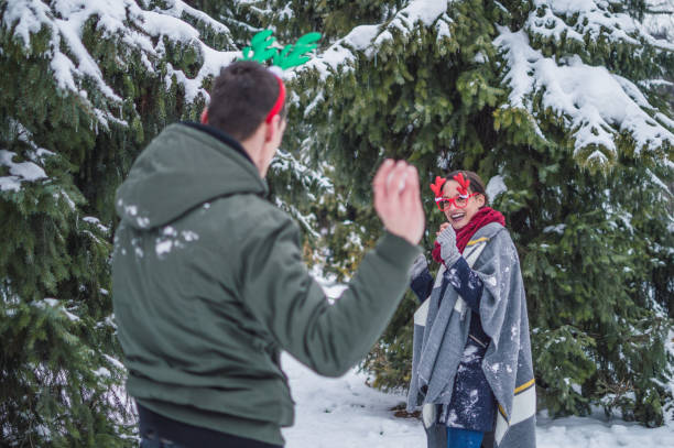 istock Snowball fight on a Christmas Eve 1072430868