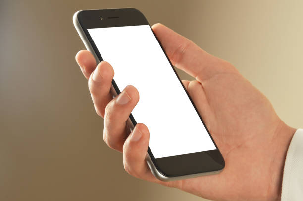 istock Male hand holding smart phone with clipping path 1072431300